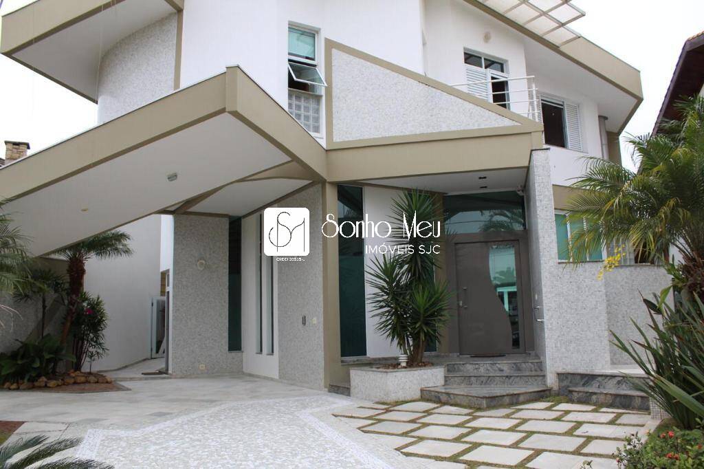 Casa de Condomínio à venda e aluguel com 4 quartos, 409m² - Foto 1